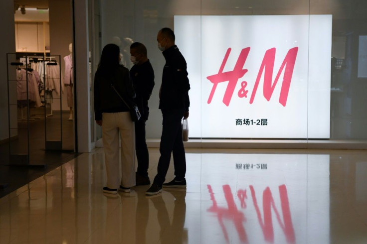 Sweden's H&M tried to limit damage in its fourth-largest market, issuing a statement saying it wanted to regain the trust of people in China, but the message was greeted with scorn on the Weibo platform
