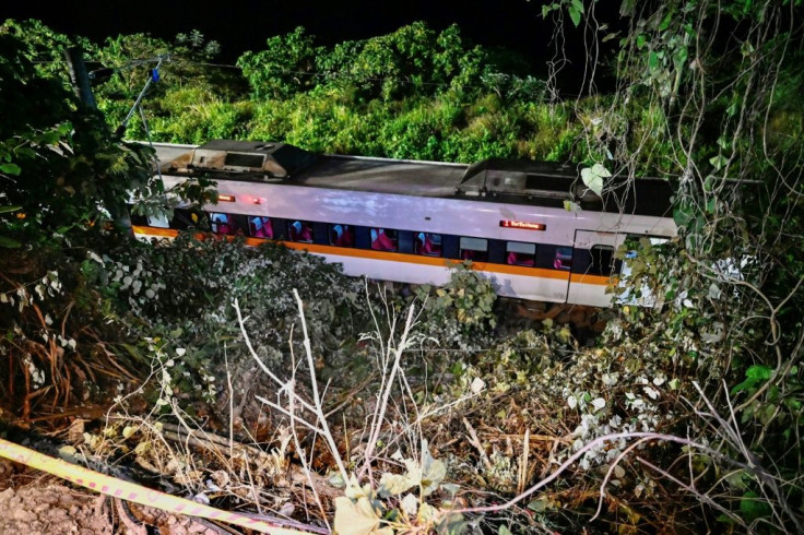 Rescuers used metal cutters to get to some carriages