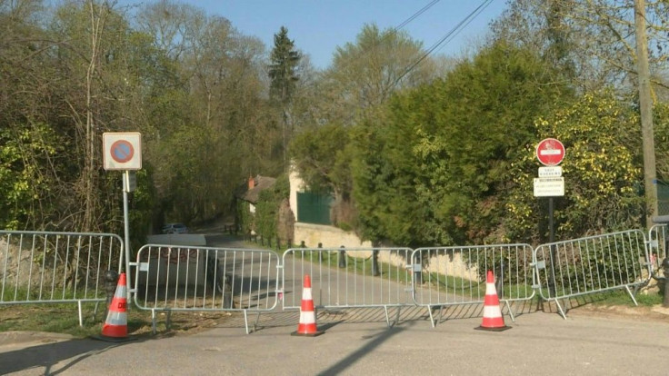 IMAGESPolice patrol the driveway of the home of former French minister and scandal-ridden tycoon Bernard Tapie, the former owner of Adidas, who was attacked along with his wife during a night-time burglary of their home.