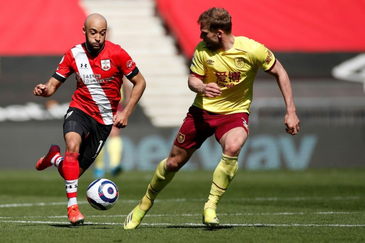 Southampton midfielder Nathan Redmond (L)