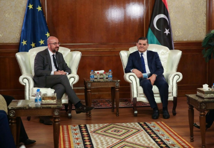 Libya's interim Prime Minister Abdul Hamid Dbeibah (R) meets with European Council President Charles Michel on Sunday