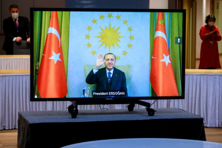 Turkey's President Recep Tayyip Erdogan gestures as he joins a video conference call with the EU Commission and EU Council presidents on March 19