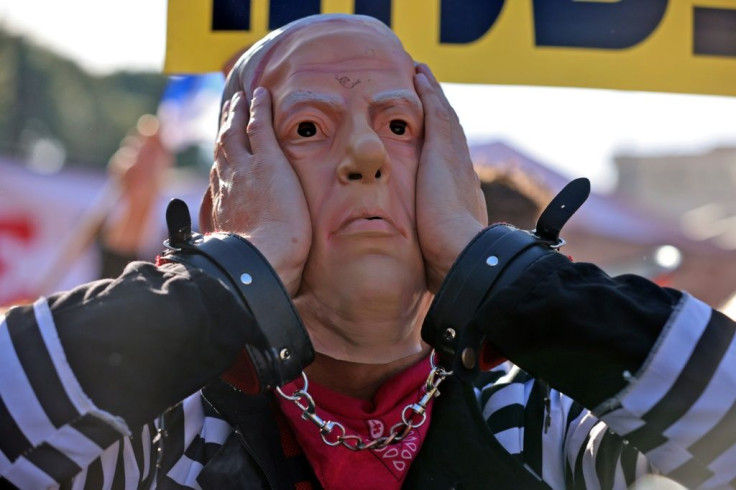 Anti-Netanyahu activists dub the leader the 'rime Minister'