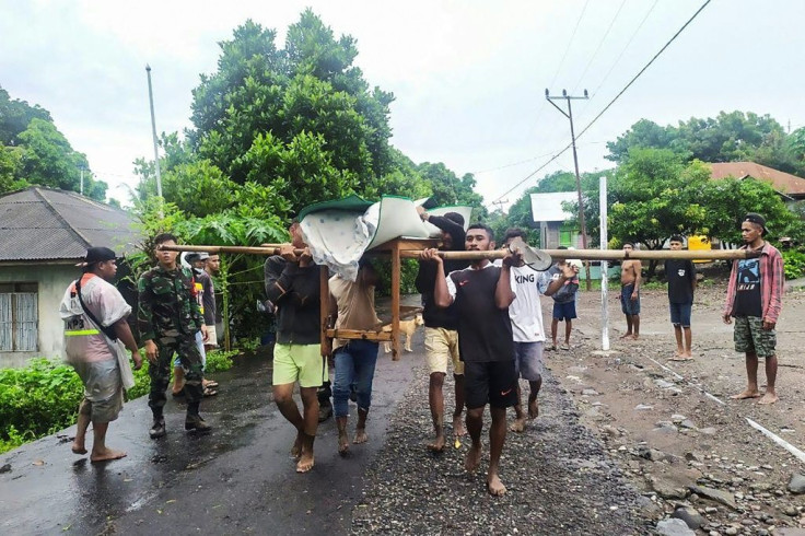 Indonesia's disaster management agency said it had recorded 130 deaths in a cluster of remote islands near East Timor, where another 27 have been officially listed as dead