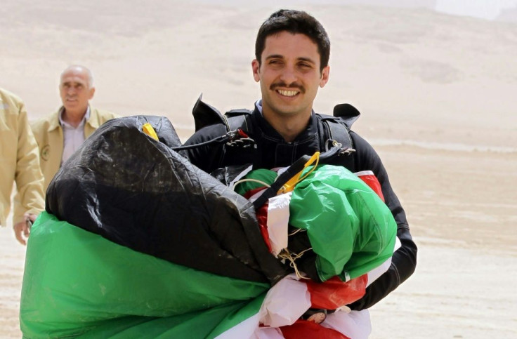 Jordanian Prince Hamzah bin Hussein shown in a file photo from April 17, 2012, carrying a parachute in the national colours in the country's Wadi Rum desert
