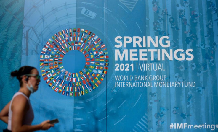 The International Monetary Fund is more upbeat about the economic outlook but cautions governments not to withdraw pandemic support too soon