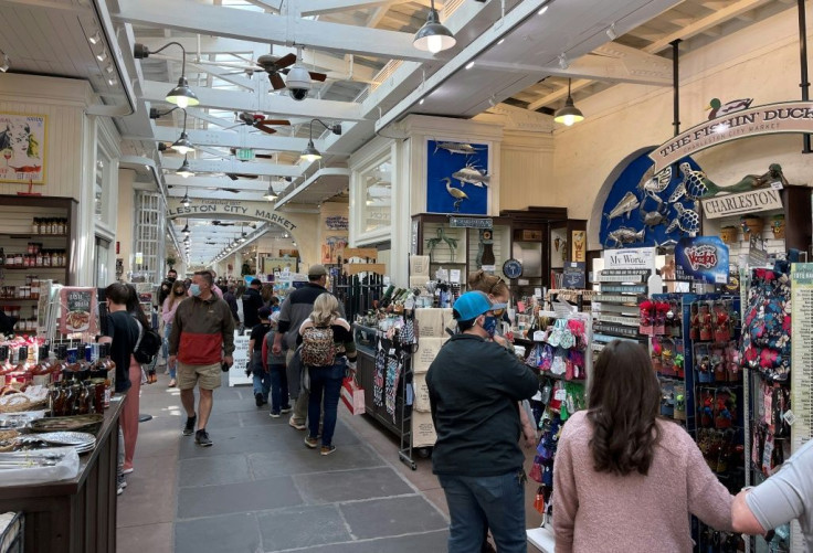 In historic Charleston City Market, South Carolina, and across the US, crowds are returning to businesses and entertainment