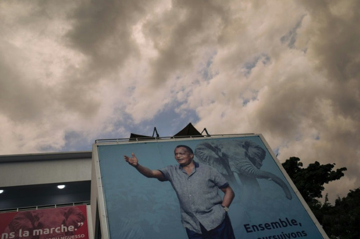 A campaign poster of Congo's re-elected President Denis Sassou-Nguesso is pictured outside outside the headquarters of the ruling Congolese Labor Party in Brazzaville on March 23, 2021