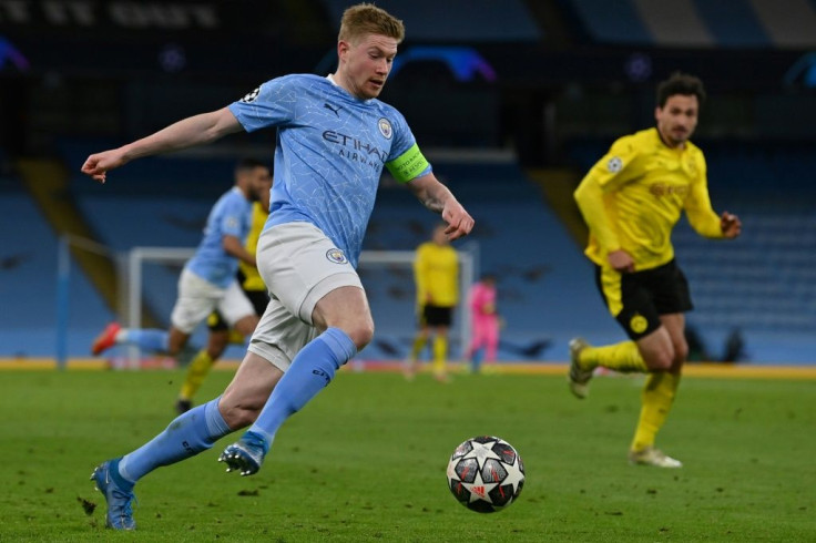 Leading from the front: Manchester City captain Kevin De Bruyne (left)scored the opening goal against Borussia Dortmund