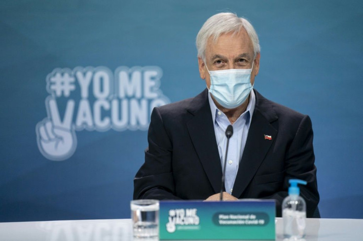 Chilean President Sebastian Pinera, pictured in March 2021, received the backing of parliament after proposing a delay in the vote to choose who will rewrite the country's constitution
