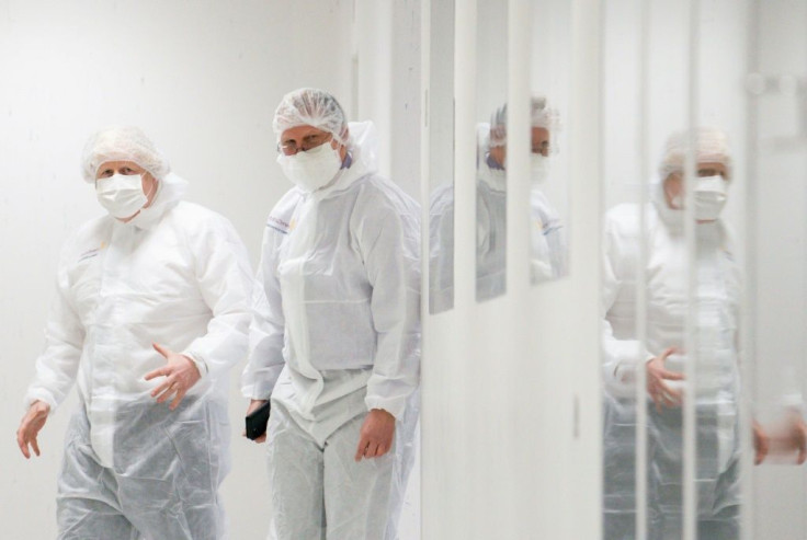 Britain's Prime Minister Boris Johnson visits an AstraZeneca facility in England
