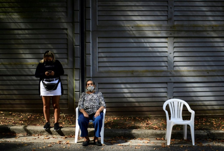 An elderly woman waits to receive the Sputnik V coronavirus vaccine at Centenario Stadium in Quilmes, Argentina on April 1, 2021