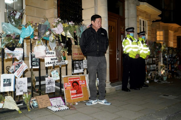 Myanmar's Ambassador to the United Kingdom, Kyaw Zwar Minn, says he will stay outside the embassy "all night", explaining "this is my building"