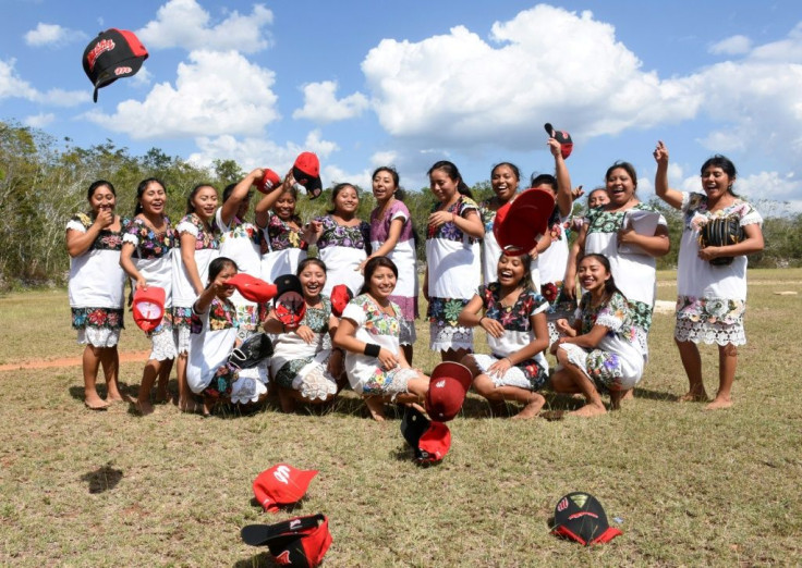 The Little Devils' hallmarks are their bare feet while playing and huipil garments embroidered by hand using techniques passed down through the generations