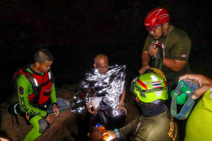 Rescue divers have freed a meditating Buddhist monk from a flooded cave in Thailand