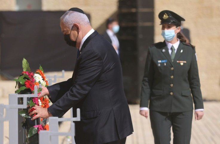 Israeli Prime Minister Benjamin Netanyahu attends a wreath-laying ceremony marking the Holocaust Remembrance Day at Warsaw Ghetto Square in Jerusalem's Yad Vashem memorial
