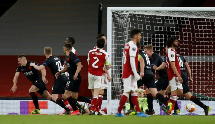 Tomas Holes (L) snatched a late equaliser for Slavia Prague away to Arsenal