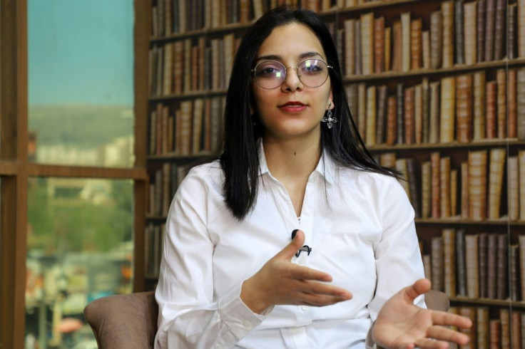 Rawan Salim, an 18-year-old activist, had to flee to northern Kurdistan region after being threatened for taking part in protests