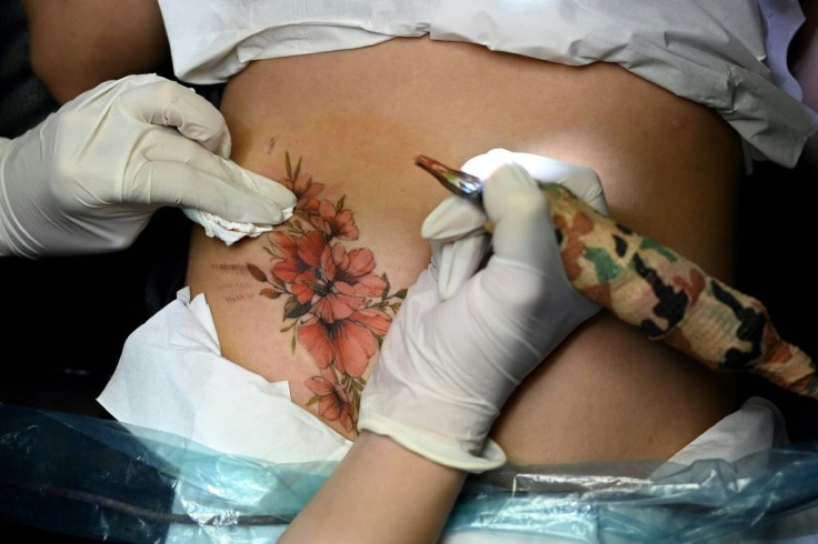 Ngoc's clients in Hanoi, where average monthly income per capita is less than $500, are often willing to spend double that amount on their body art