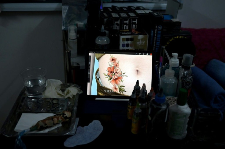 Ngoc has decided to focus her tattooing work on women with scars, both physical and mental