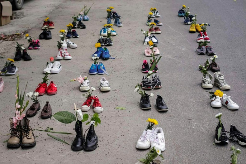 Shoes and flowers are displayed in Mandalay in a protest against the military coup