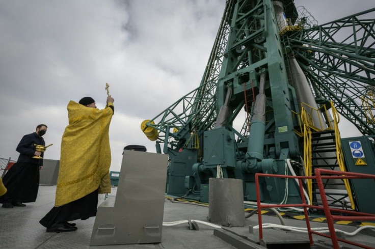 An Orthodox priest blessed the rocked before takeoff