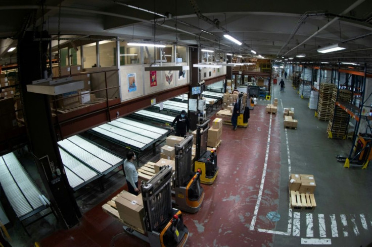 A French warehouse on the outskirts of Paris takes delivery of doses of the Pfizer/BioNTech vaccine