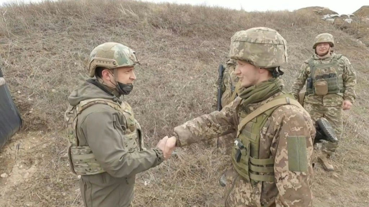 IMAGES Ukrainian President Volodymyr Zelensky travels to the country's eastern frontline and meets with soldiers soldiers as German Chancellor Angela Merkel calls on Moscow to reduce its troop buildup near Ukraine.