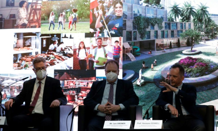 (R-L) Colliers Germany's Hermann Schnell and Hamburg Port Consulting's Lars Greiner and Suheil Mahayni take part in a press conference at Beirut's port on April 9