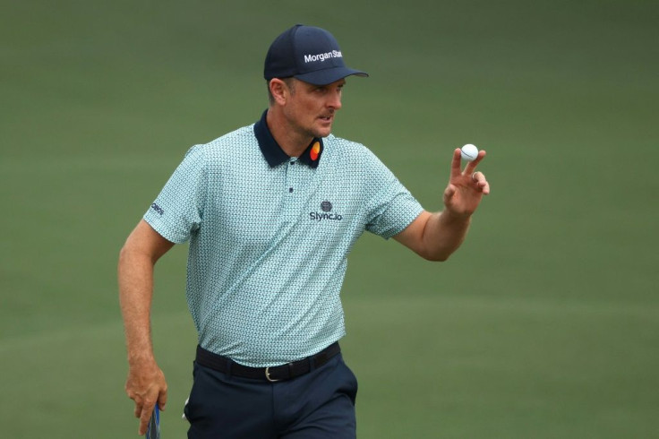 England's Justin Rose fired a level par 72 Friday at Augusta National to stay atop the leaderboard of the 85th Masters