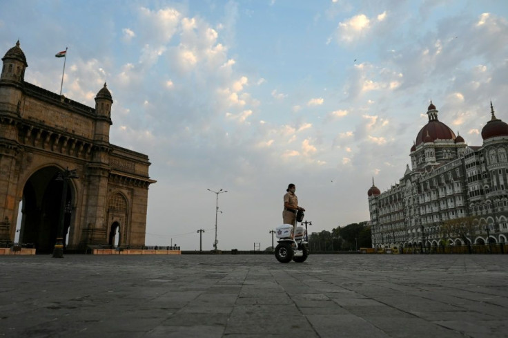 In Mumbai restaurants are shut and public gatherings of more than five people are banned as Maharashtra state goes into a weekend lockdown