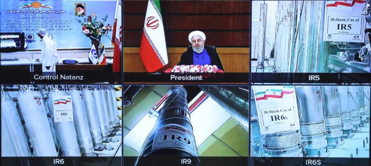 A screen grab from a videoconference shows views of centrifuges and devices at Iran's Natanz uranium enrichment plant, as well as Iran's President Hassan Rouhani delivering a speech