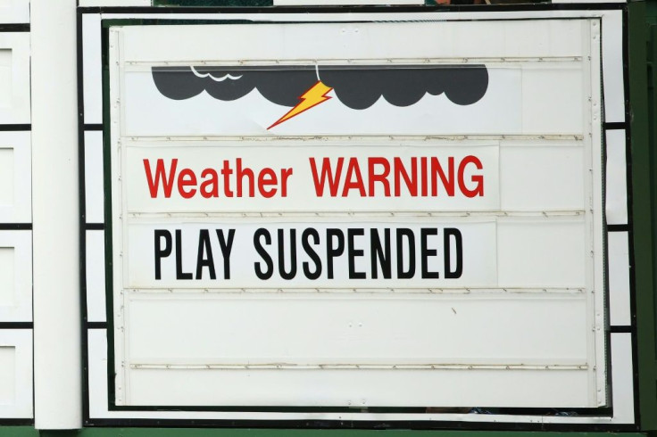 Japan's Hideki Matsuyama caught fire after a 78-minute weather delay to seize a four-shot lead after three rounds of the Masters