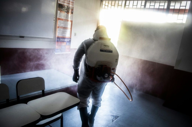 Workers are sanitizing 11,402 polling stations nationwide, which will be open for 12 hours of voting