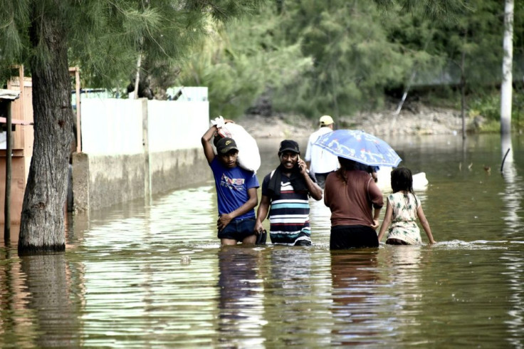 Environmental disasters like the flooding seen here in Dili, East Timor, on April 9, 2021, have hammered low-income countries already struggling with the costs of the Covid-19 pandemic