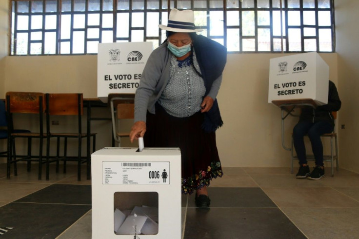 An indigenous woman votes at a polling station in Cuenca, Ecuador on April 11, 2021