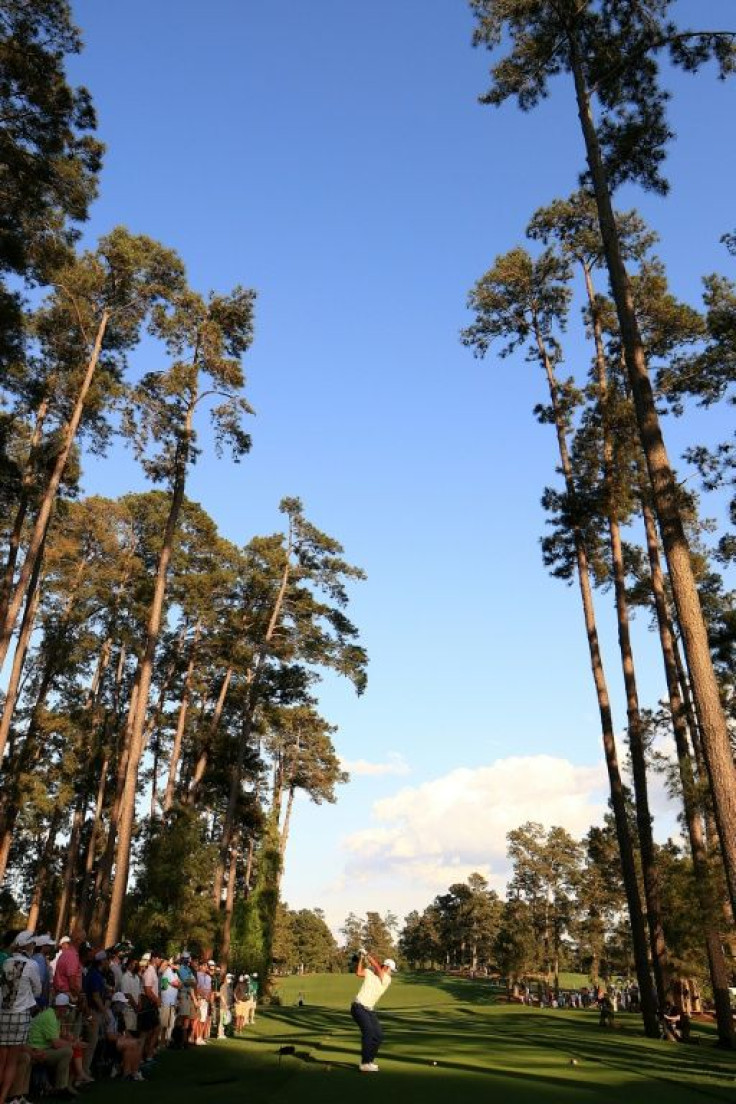 Hideki Matsuyama tees off on the 17th hole at Augusta National as he closes in on victory in the Masters