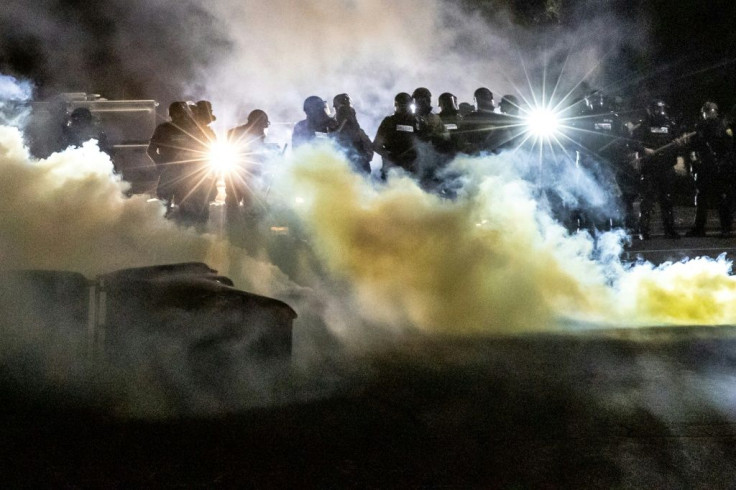 Protesters were met by police in riot gear in a suburb of Minneapolis, Minnesota after a Black man was fatally shot by a police officer