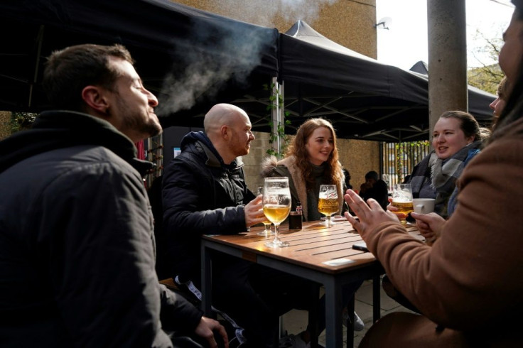 Shops, gyms, pub gardens and hairdressers reopened in Britain as coronavirus restrictions were partially lifted