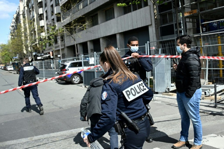 Police cordon off the area outside Paris' Henry Dunant hospital after a fatal shooting