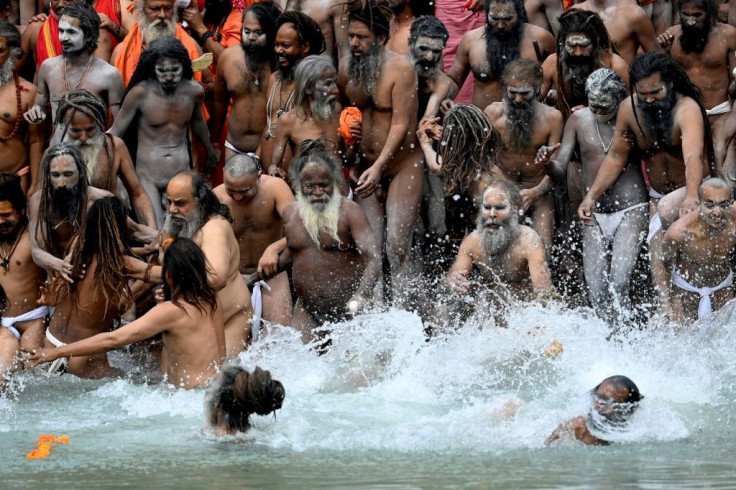 In India's Himalayan city Haridwar, Hindu pilgrims squeezed shoulder-to-shoulder on the banks of the Ganges River as they celebrated Kumbh Mela