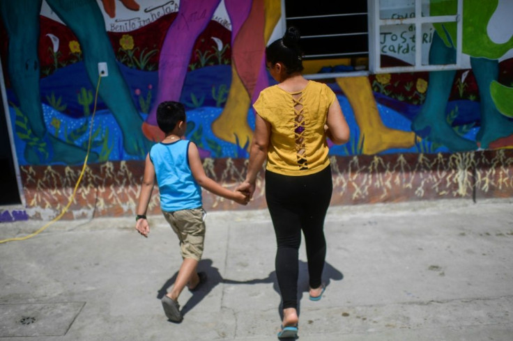 Greyssi Venegas and her son Eduardo left Honduras after she lost her job on a coffee farm following hurricanes