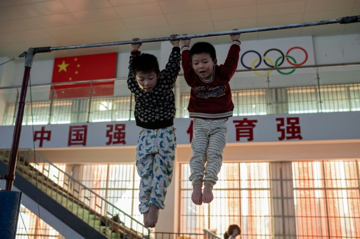 Young gymnasts train at the Li Xiaoshuang Gymnastics School in Xiantao, Hubei province