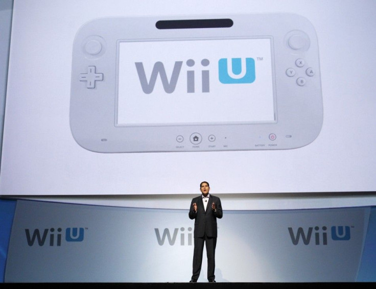Fils-Aim, President of Nintendo of America, presents the new Wii U controller at a media briefing during the Electronic Entertainment Expo, or E3, in Los Angeles