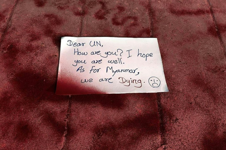 Protesters spray-painted pavements red in a Yangon suburb and left a note that read: "Dear UN, How are you. I hope you are well. As for Myanmar, we are dying."