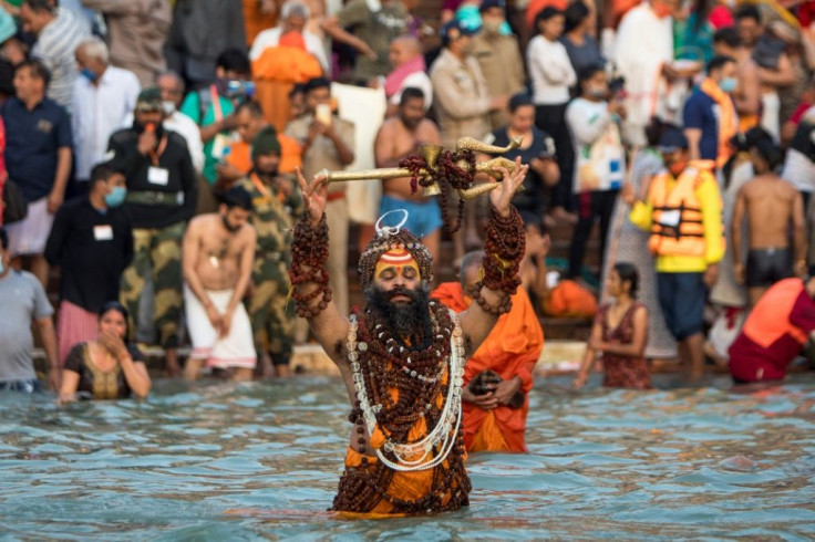Hundreds of thousands of mostly maskless Hindu devotees have descended on the River Ganges for the event