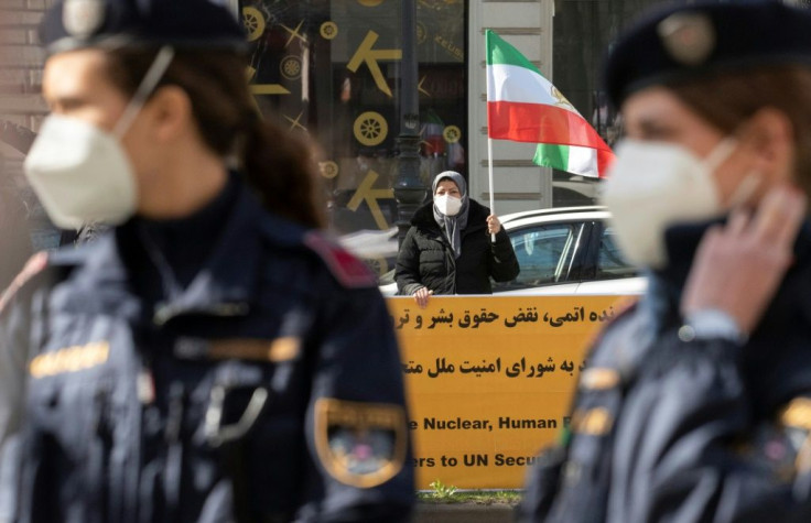 Protesters demonstrate against Iran's government outside the Vienna hotel where diplomats are seeking to revive the nuclear accord