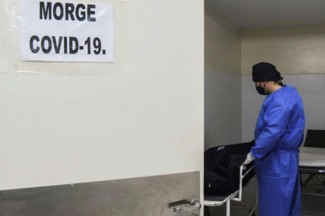 A healthworker at a morgue in Paraguay