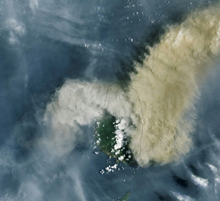 This NASA Earth Observatory handout image obtained April 13, 2021 shows a Operational Land Imager (OLI) on Landsat 8 satellite image of the volcano eruption of the La Soufriere Volcano on the Caribbean island of St. Vincent on April 9, 2021 Massive powe