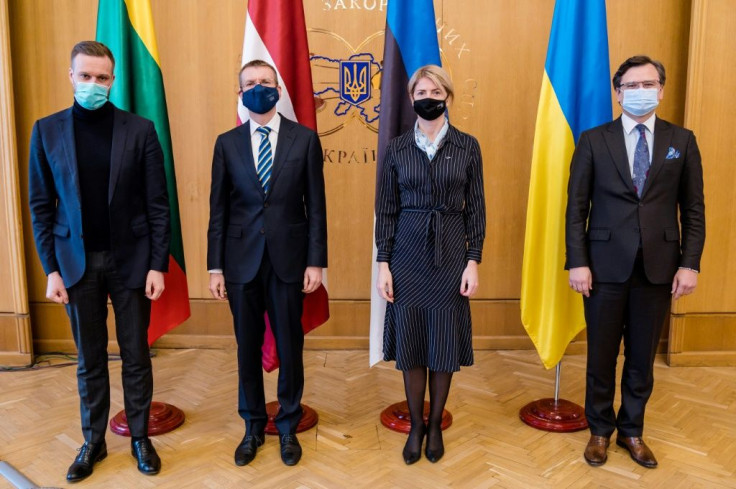 Foreign ministers, from left to right: Lithuania's Gabrielius Landsbergis, Latvia's Edgars Rinkevics, Estonia's Eva-Maria Liimets and Ukraine's Dmytro Kuleba
